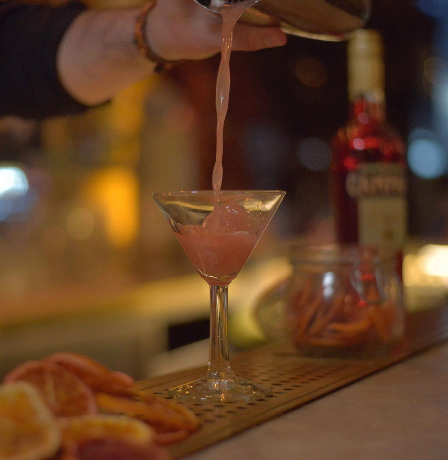 A cocktail poured to go with dinner